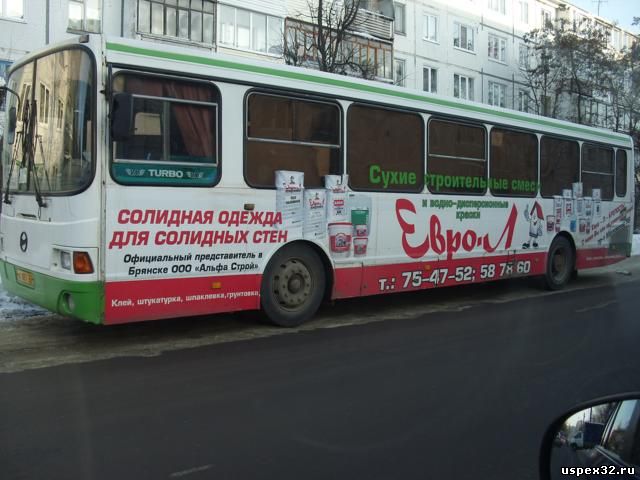 Монтаж бортовой рекламы на автобусе "Евро Л" 