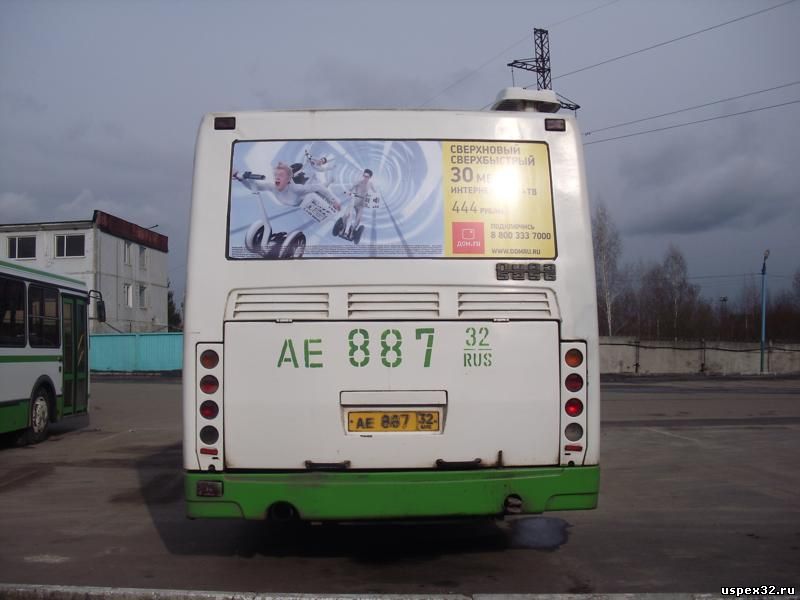 Размещение наружной рекламы на заднее стекло автобуса "ДОМ.RU"