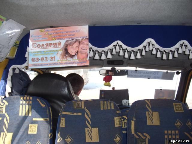 Монтаж рекламы в маршрутном такси "Шарм"
